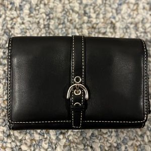 Coach Soho black leather wallet with silver buckles